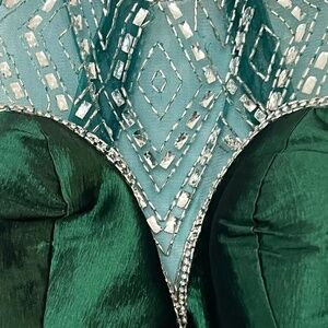 Elegant Impeccable Mac Duggar Metalic evening gown